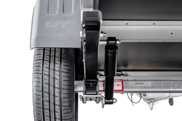 Leichter Anhänger auf Blattfedern 230×125 UNITRAILER GARDEN 230/R KIPP mit Gitterwänden, H-0-Rahmen und blauer Plane-Neu